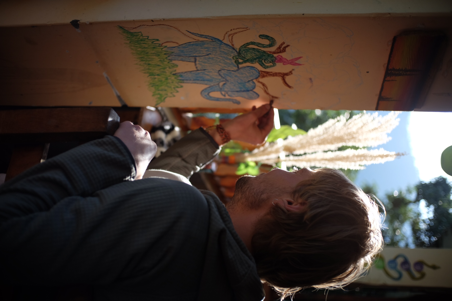 Art Café at Mozo Inn & Cafe with wall art in progress