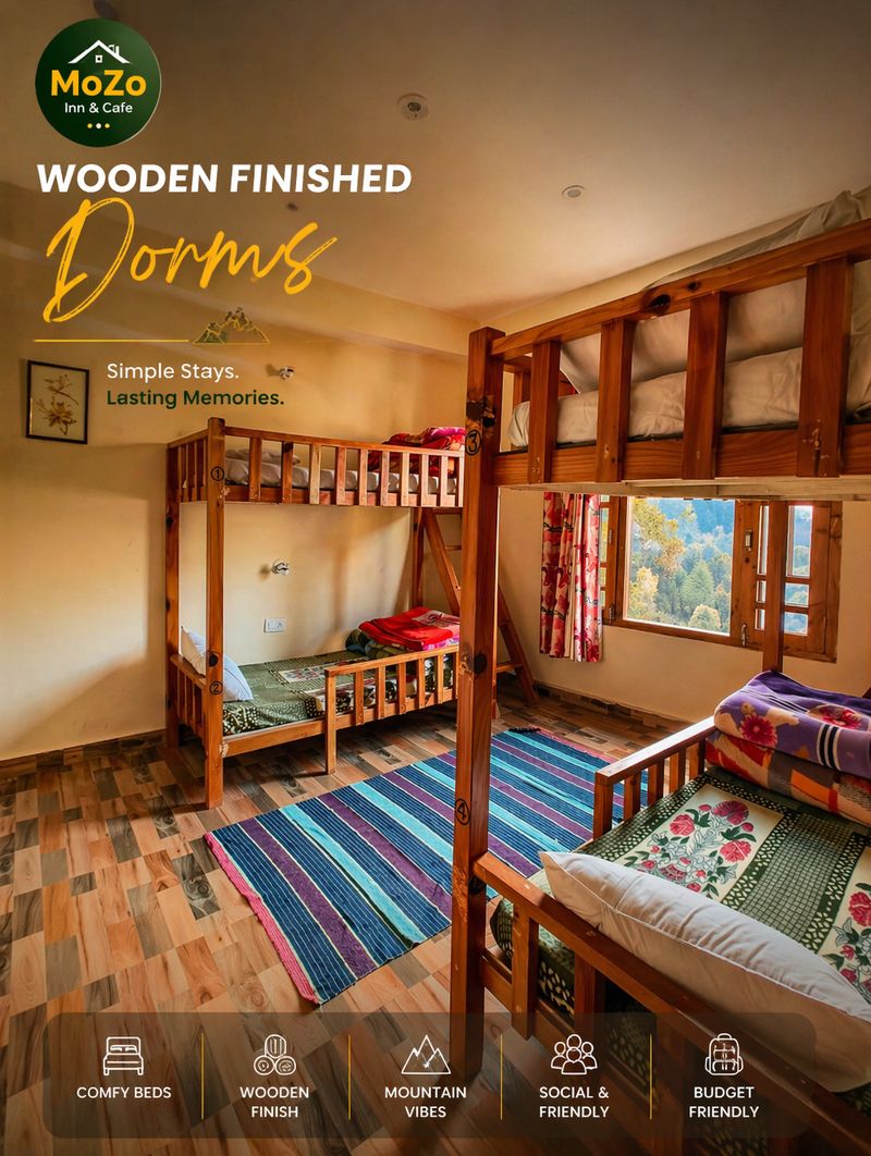 Wooden-finished dorm room at Mozo Inn & Cafe with bunk beds and mountain view